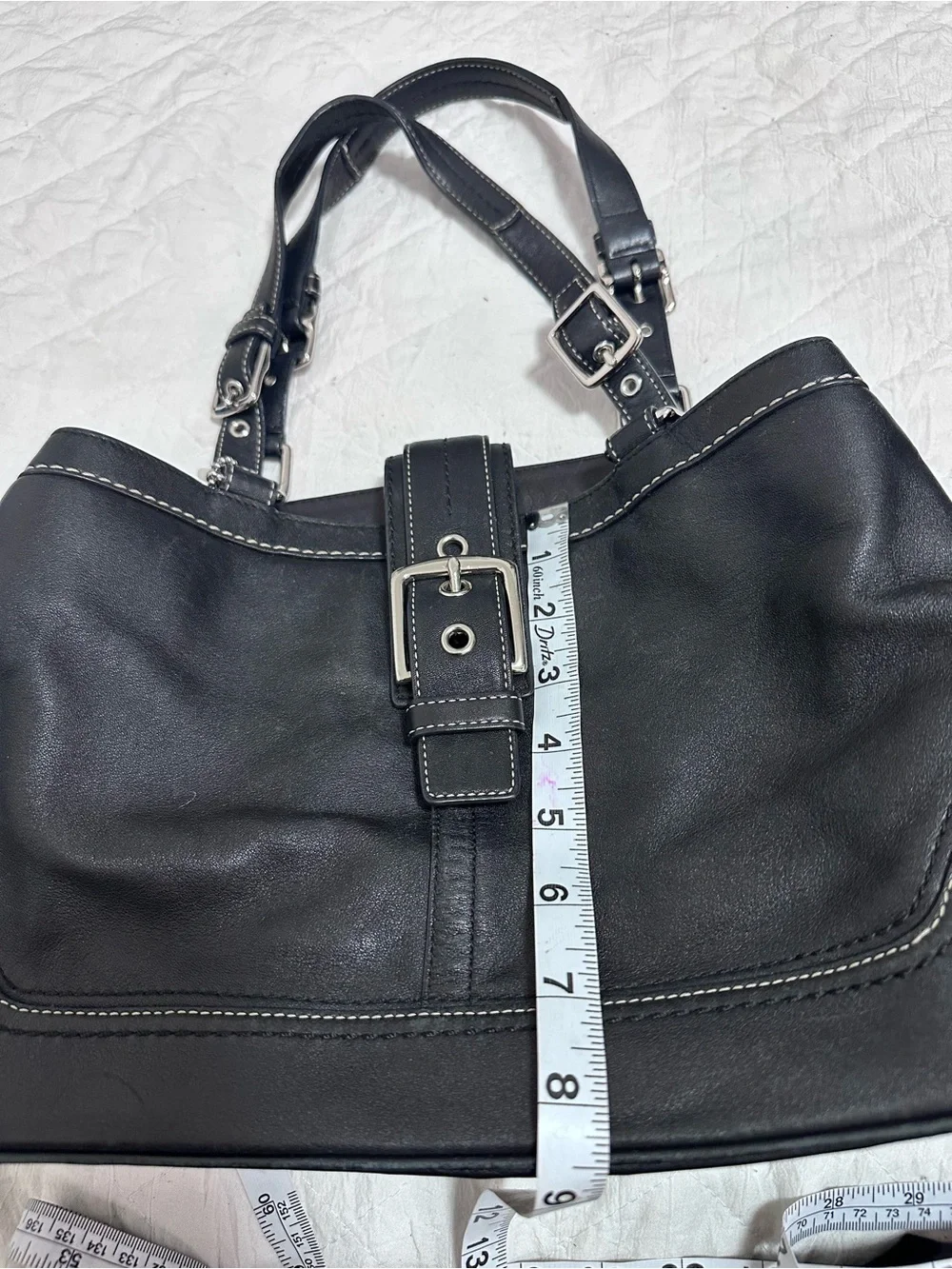 Coach tag subtle leather